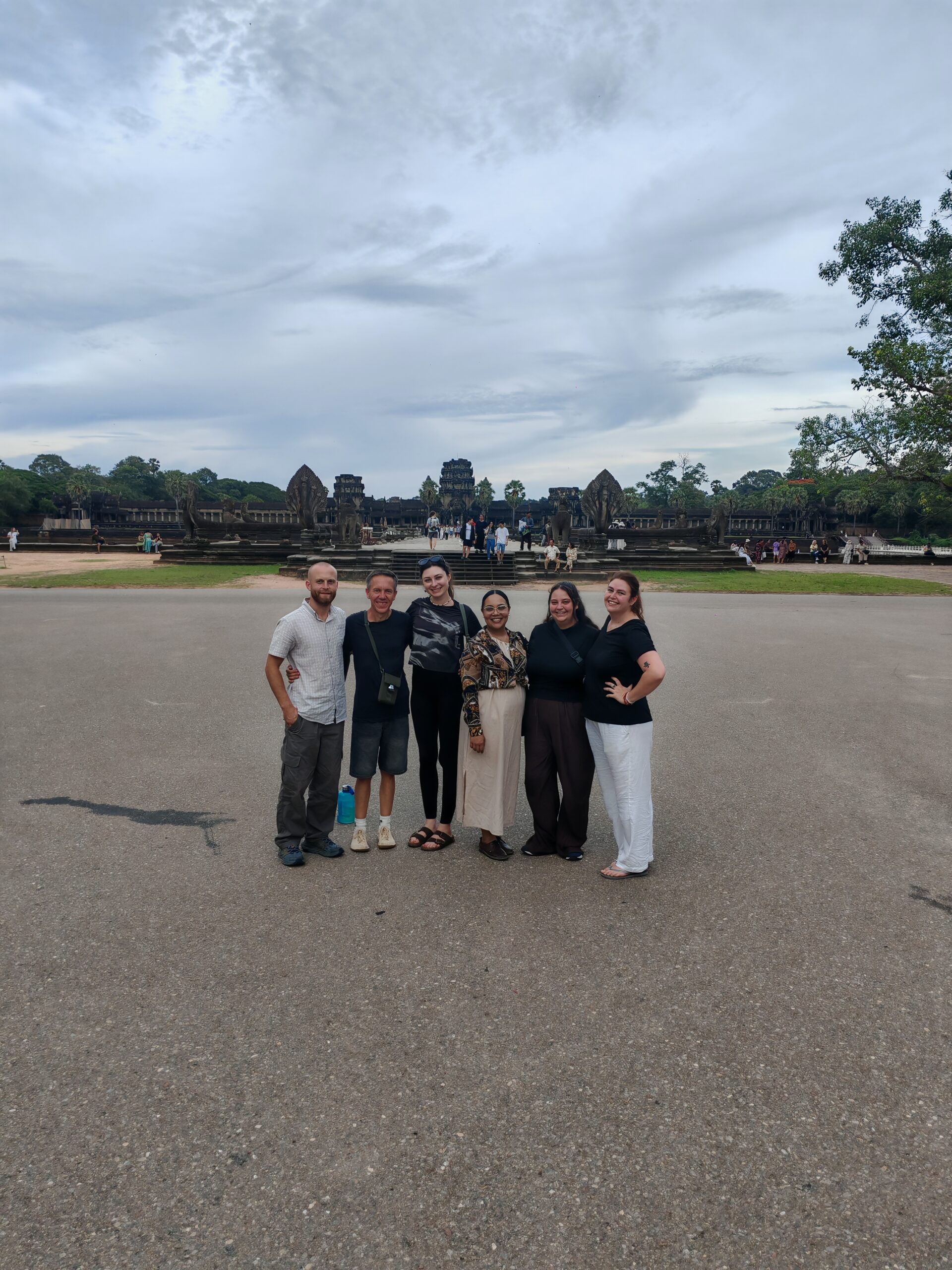 A Destination TEFL cohort at Angkor Wat during golden hour, Siem Reap